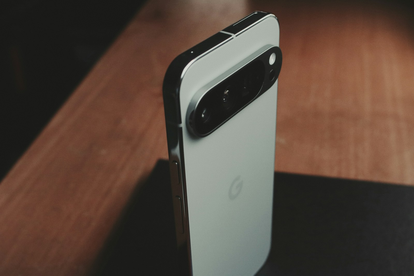 A close up of a cell phone on a table